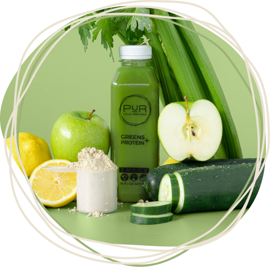 PUR Cold-Pressed Greens + Protein juice with fresh celery, cucumber, apple, lemon, and protein powder in a PUR circular frame.